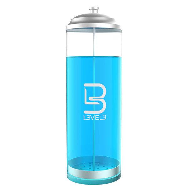 Clear water bottle with blue liquid and silver cap 