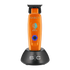 StyleCraft Saber SC421O cordless trimmer in orange on charging stand