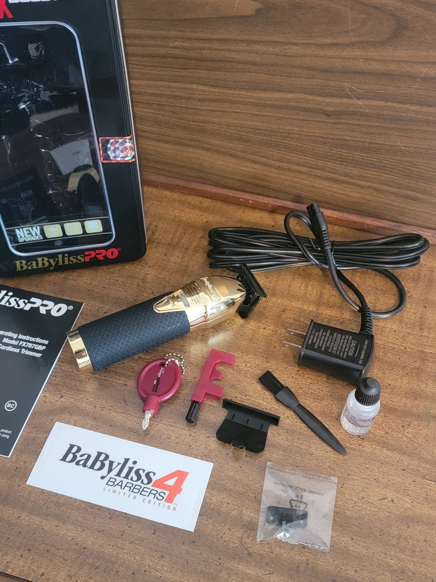 babyliss-boost_modelfx787gbp-hair-trimmer-goldfx-metal-lithium-golden with accesories